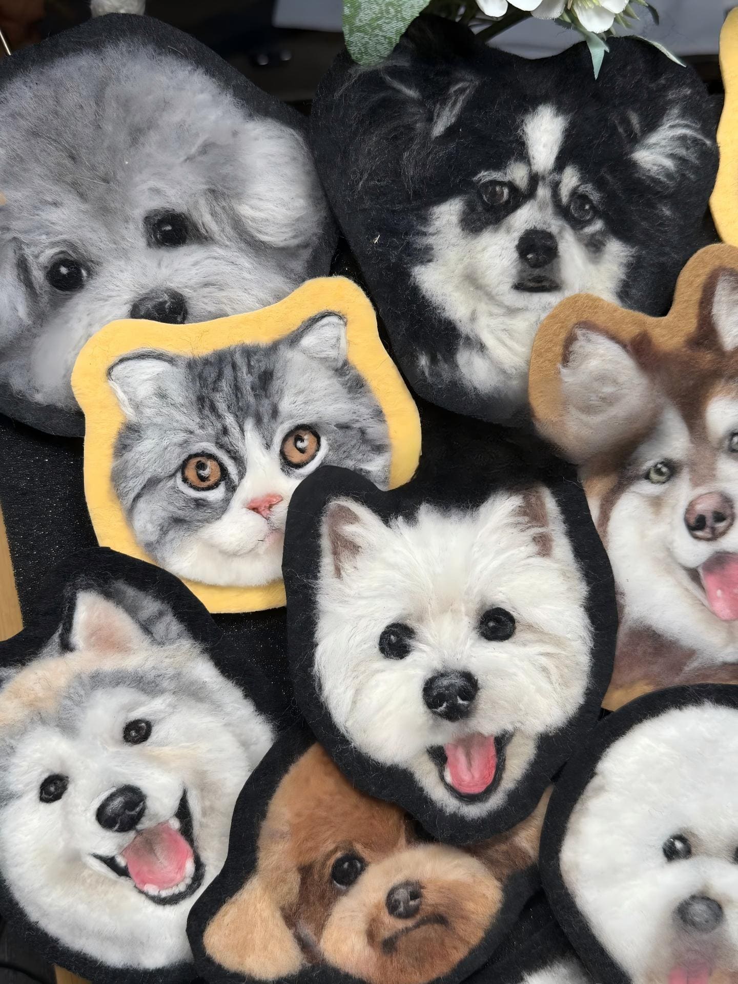 Animal face keychain charms with embroidered dog faces