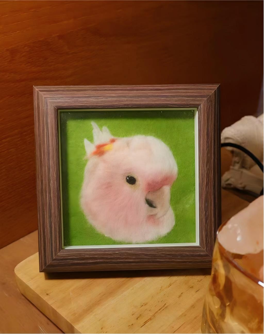 Dark wood framed pet portrait of a small white and pink bunny